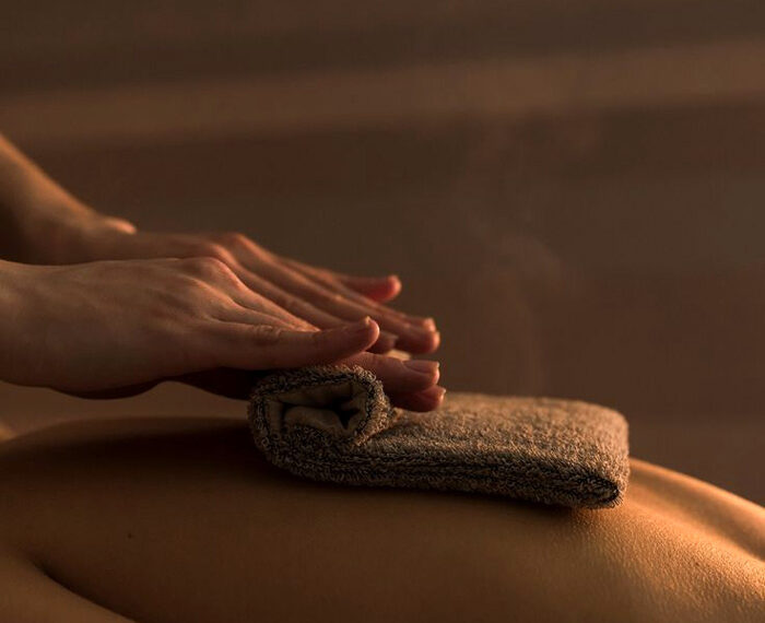 Masaje Laken con toallas calientes